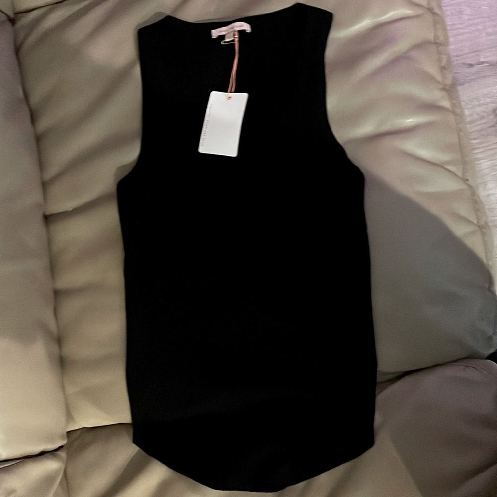 Skies are blue rubbed black tank